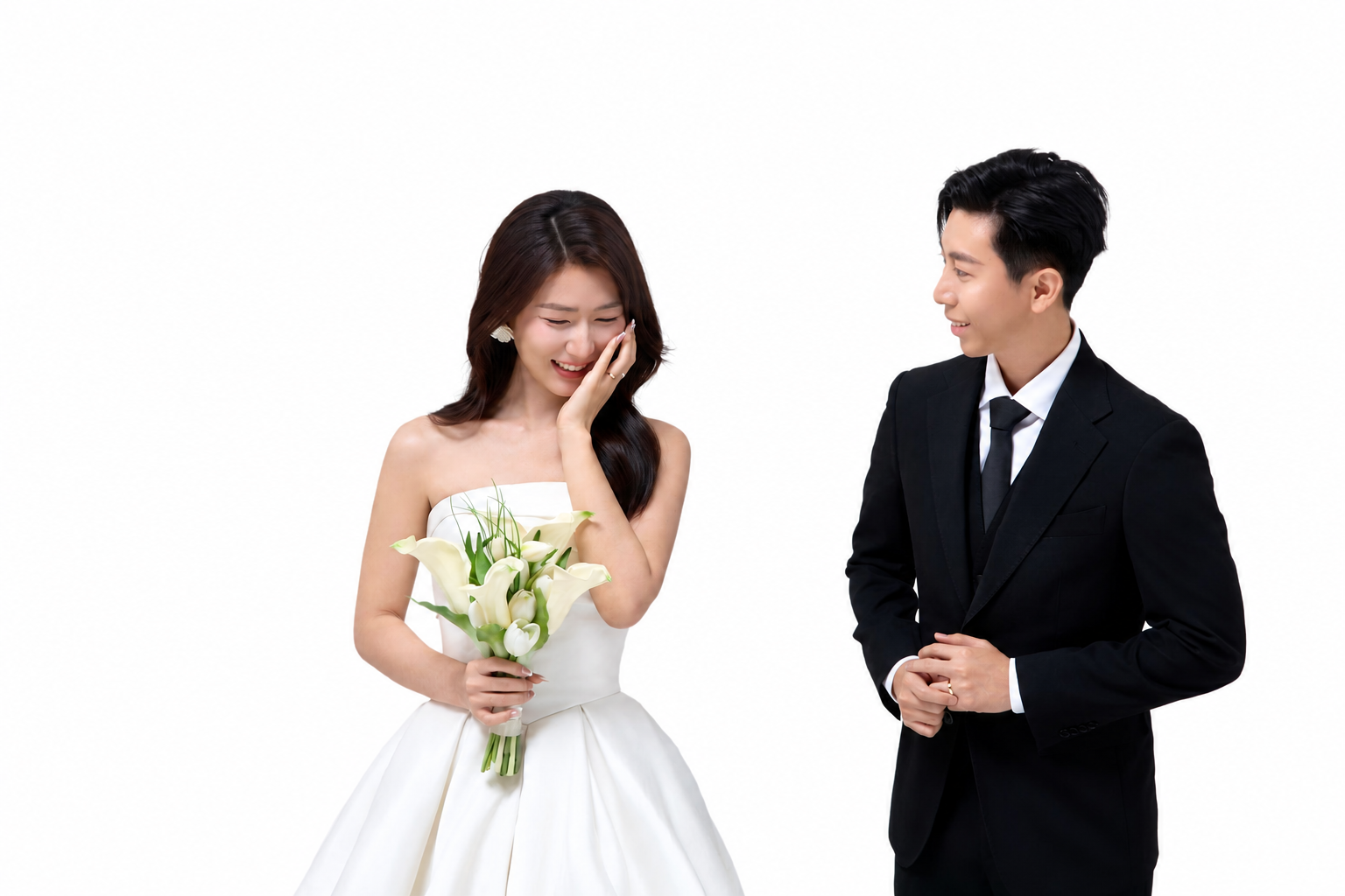 Zaw and Shwan together in formal wedding attire against a white studio background