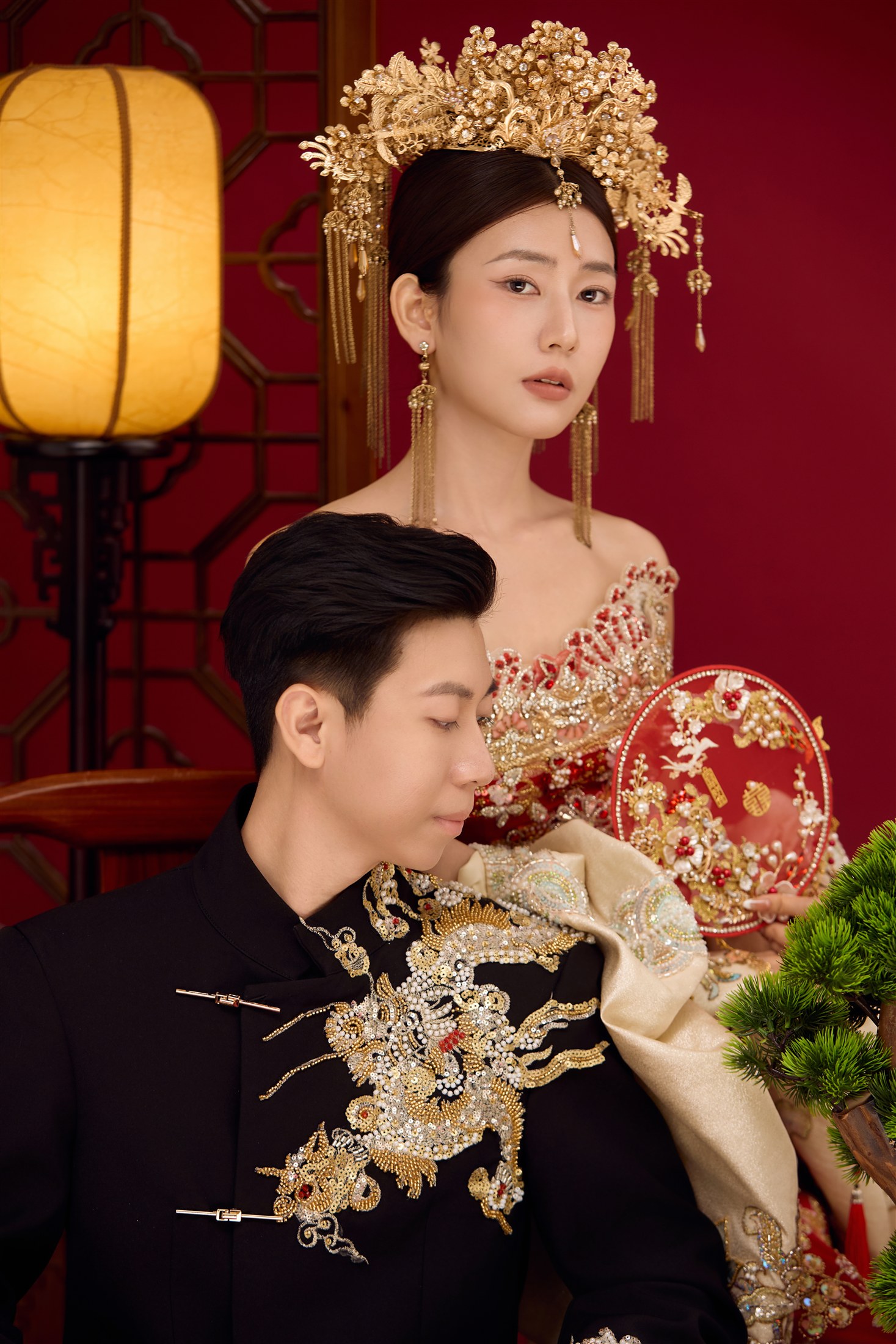 Zaw and Shwan in traditional wedding attire