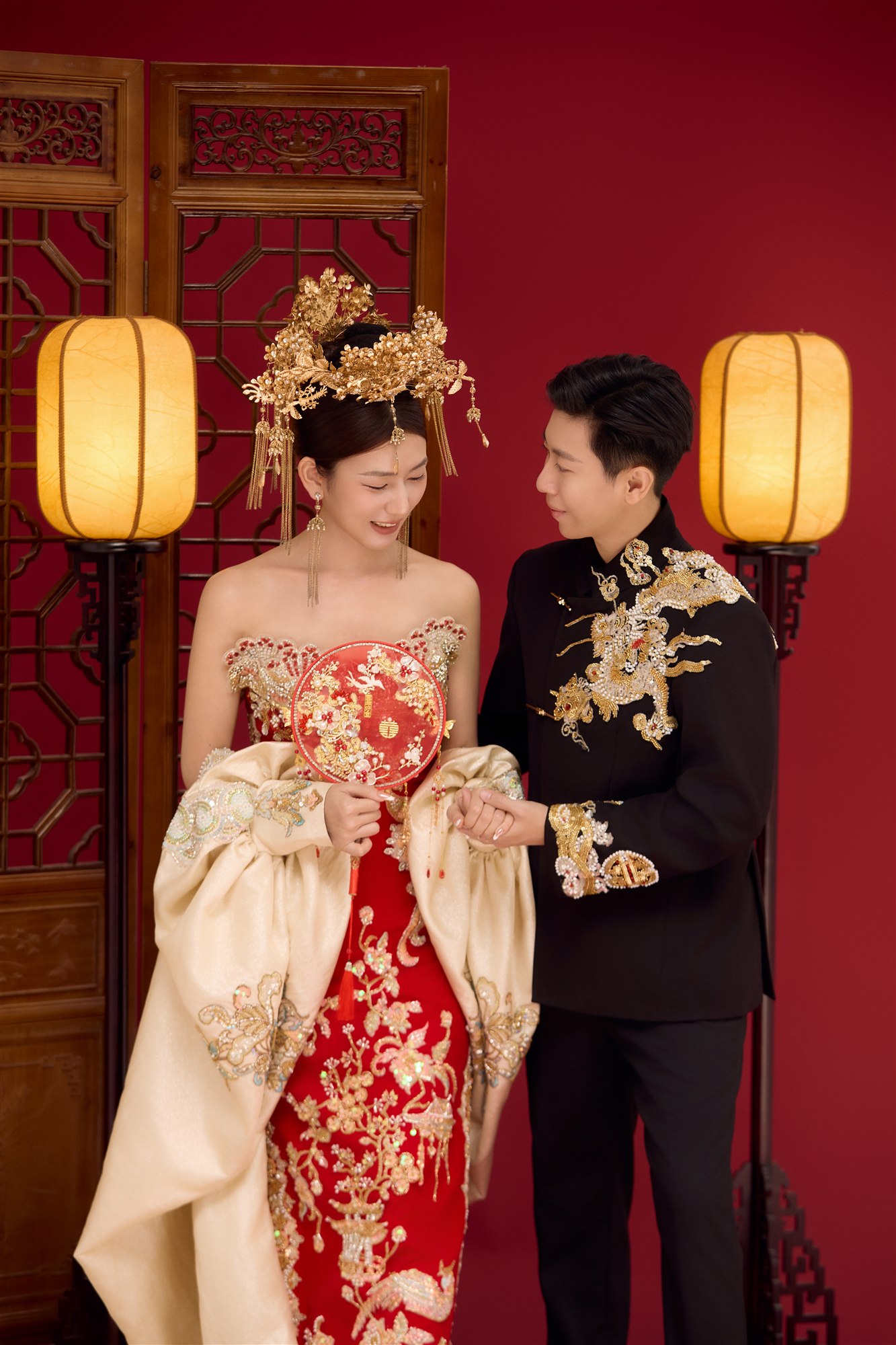 Zaw and Shwan together in traditional wedding attire