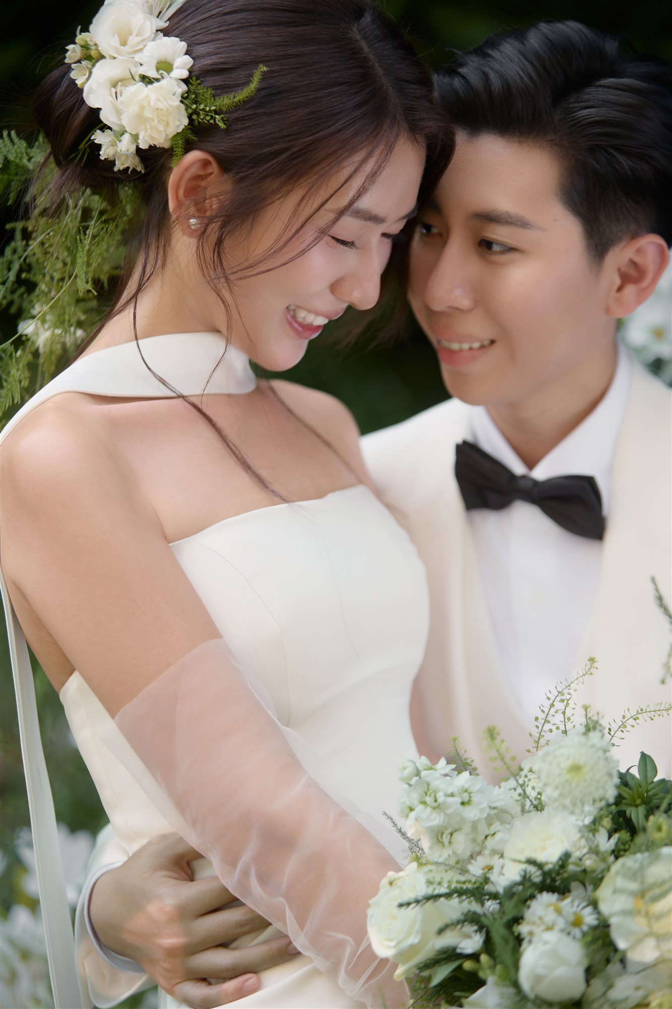 Zaw and Shwan close together in the garden