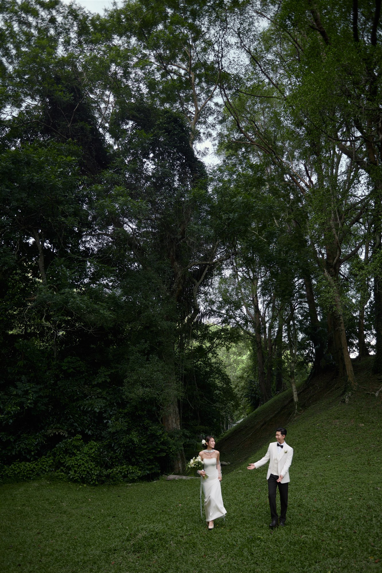 Zaw and Shwan walking through the forest